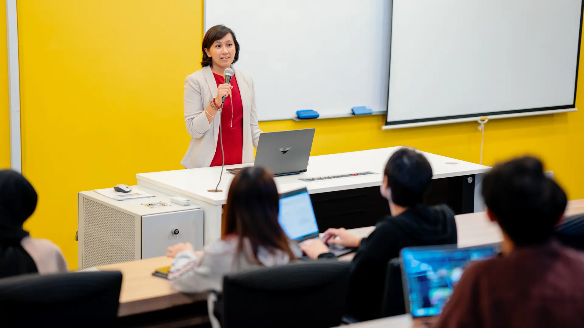 Taylor’s lecturer delivering an engaging classroom lecture to students
