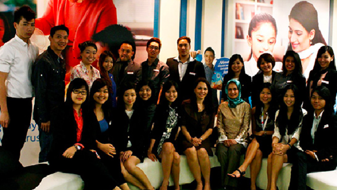 Media and Communication students taking group photos at Dutch Lady Malaysia Office