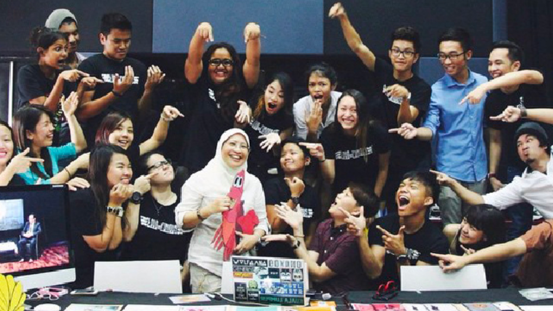 Media school lecturer with students at Taylor's Experiment Theatre