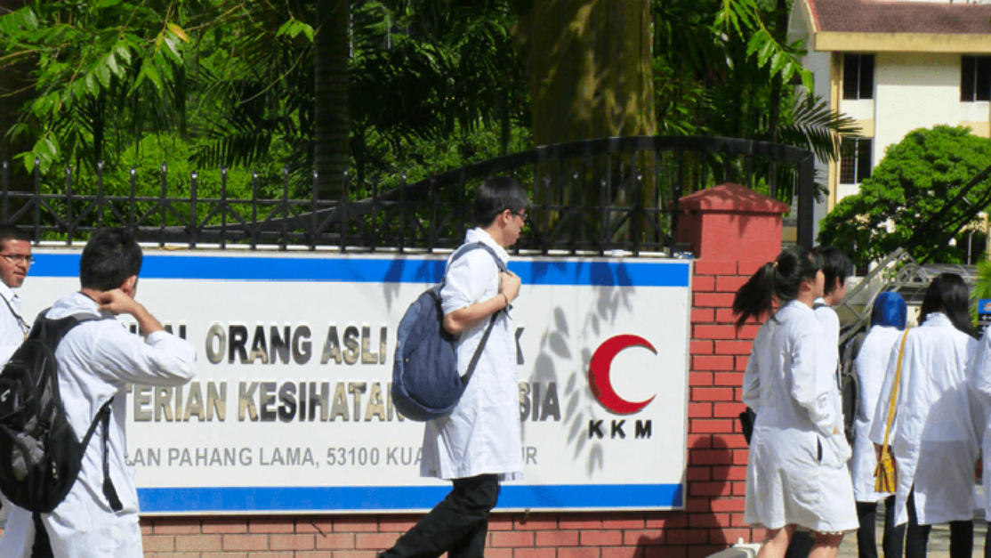 Students passing by the school gate
