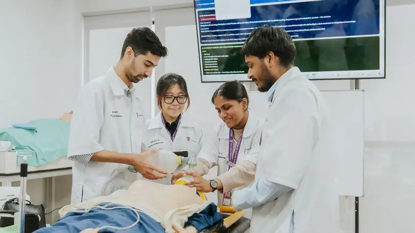 Taylor’s medical students practising bag-valve-mask ventilation on a simulation manikin