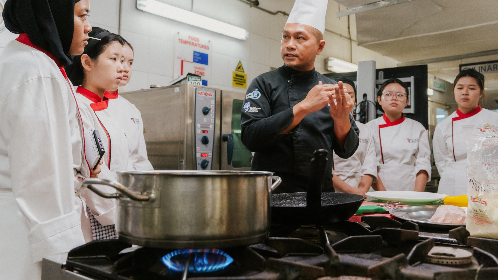 Chef mentoring aspiring culinary professionals