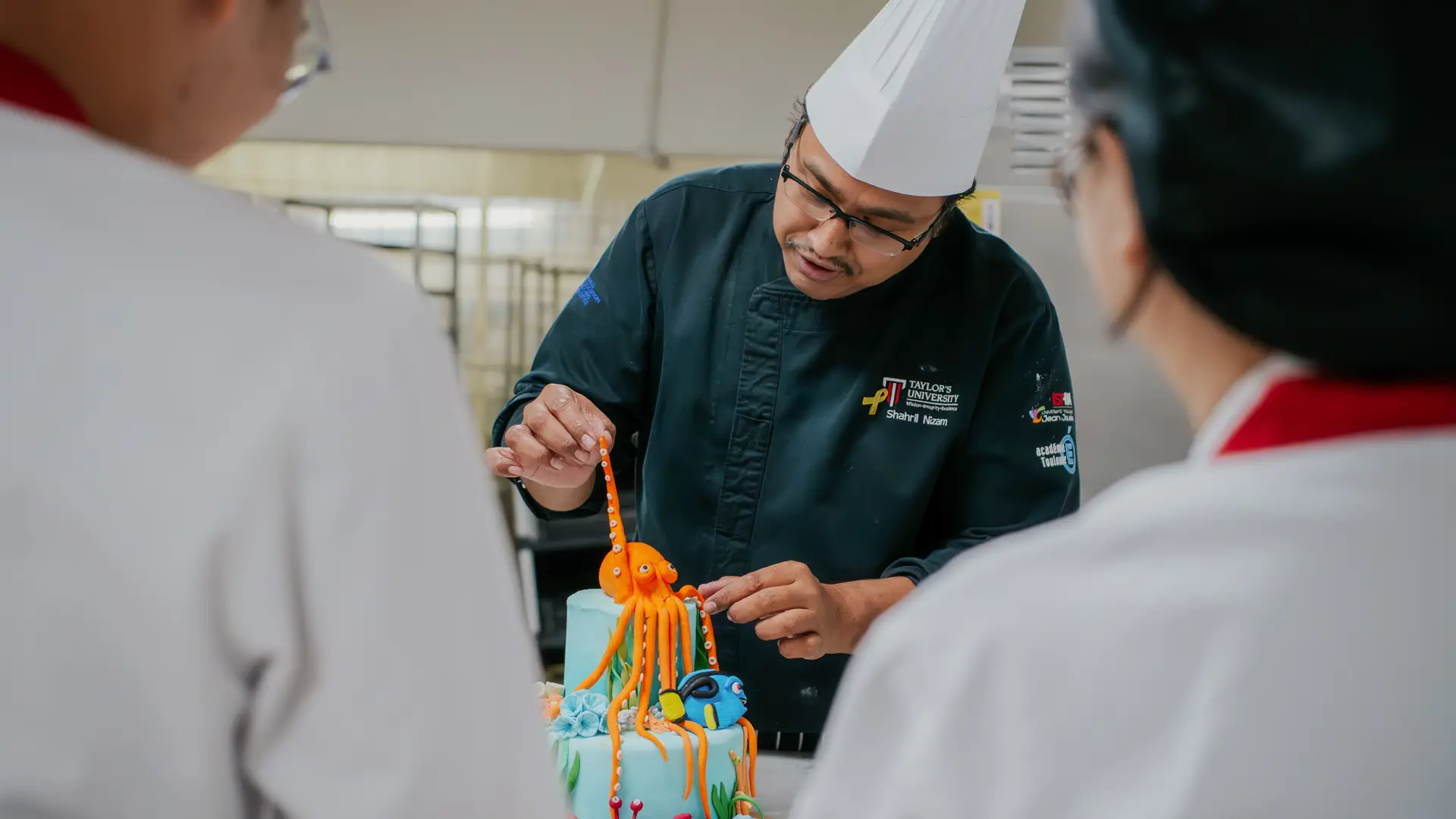 Chef mentoring aspiring culinary professionals