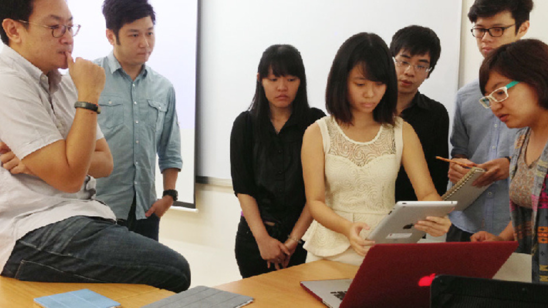 group of design students discussing about an assignment