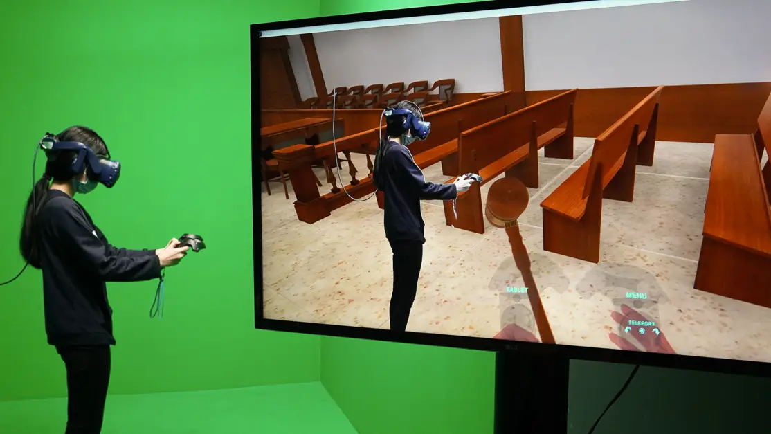 Student using virtual reality technology in an immersive simulation environment