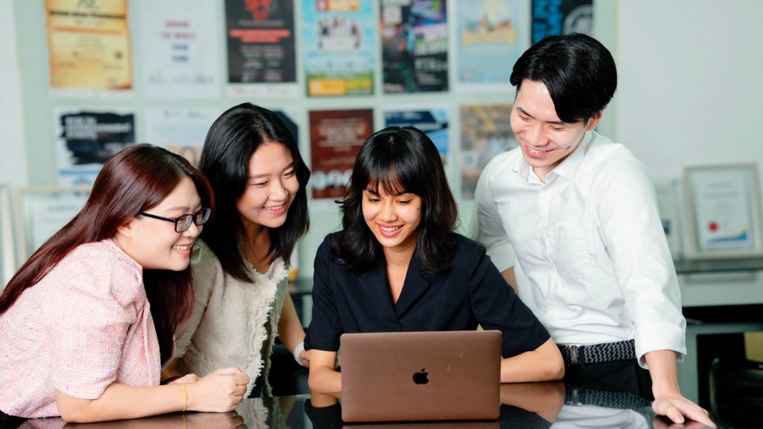 Group of students surfing the internet